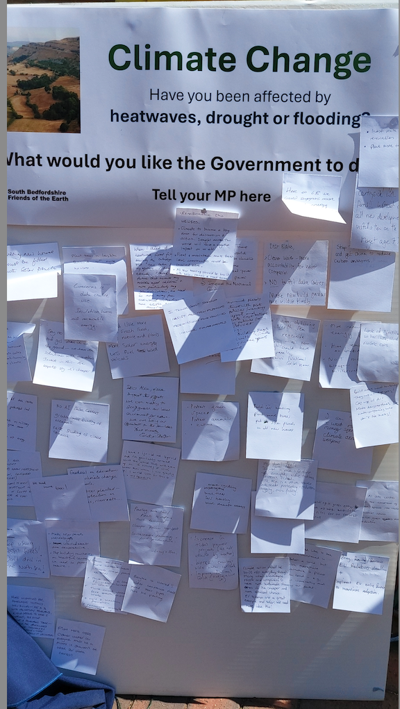 Image shows residents' letters to Alex Mayer MP on a board at the South Bedfordshire Friends of the Earth stall on 25 July 2026